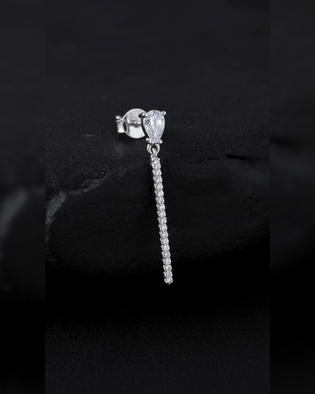 pear shape with a dangling bar stud earring.