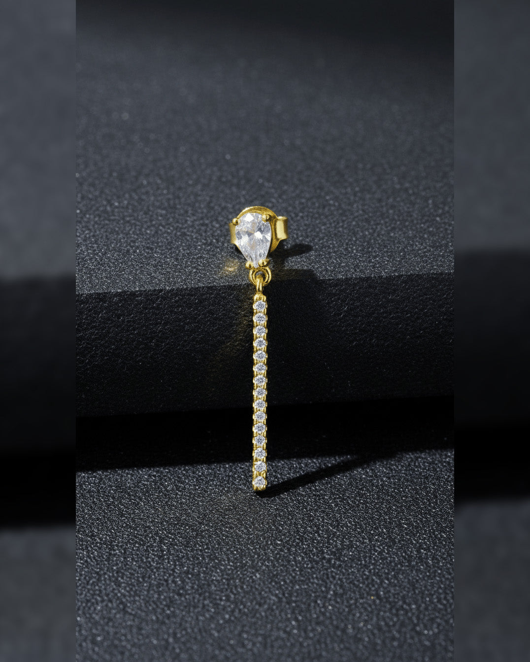 pear shape with a dangling bar stud earring.
