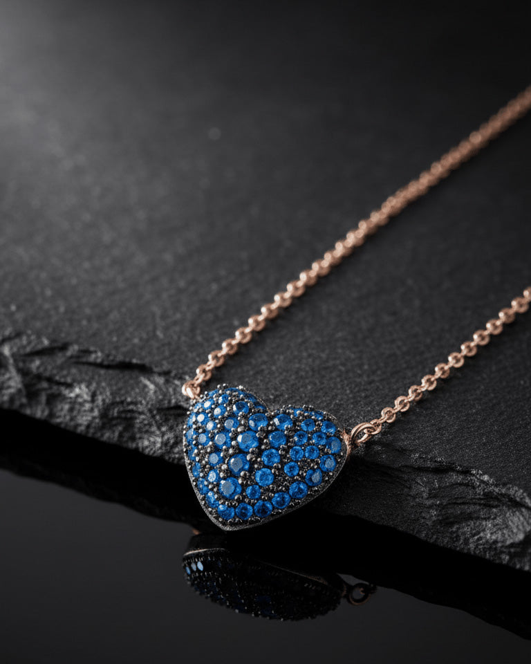 Rosegold sapphire color CZ heart shape necklace.