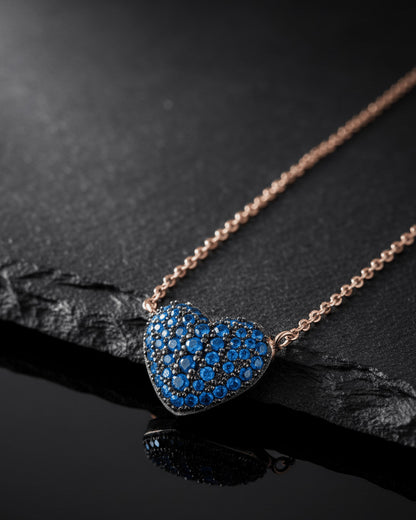Rosegold sapphire color CZ heart shape necklace.
