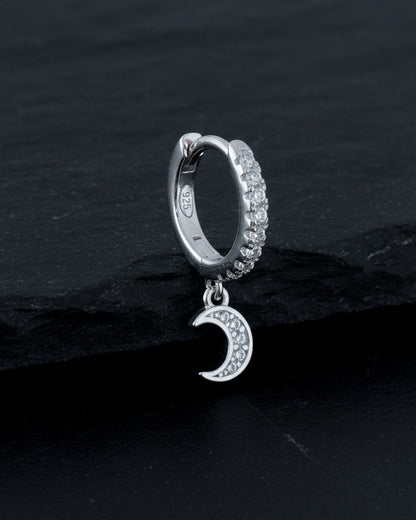 CZ huggie hoop with dangling small crescent shape.