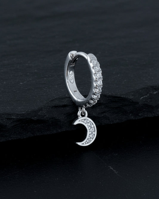 CZ huggie hoop with dangling small crescent shape.