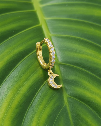 CZ huggie hoop with dangling small crescent shape.