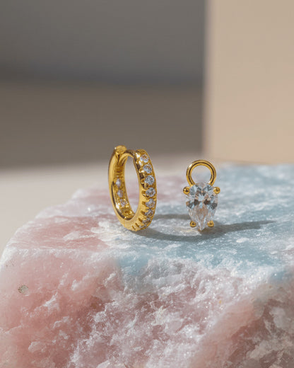 hoop earrings with removable pear shaped stone.