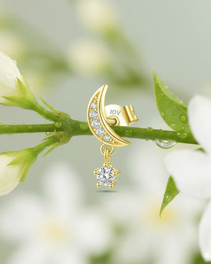 crescent shape with dangling round stone.