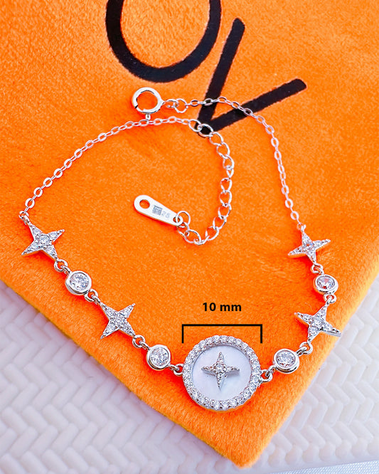 mother of pearl and CZ stones in bezel setting bracelet.