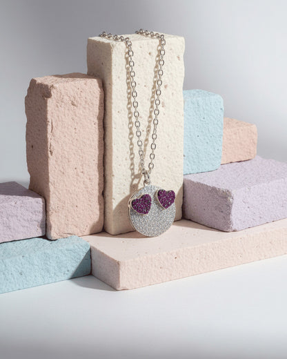 Love emoji shape necklace.