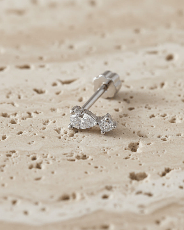 pear and round flatback piercing.