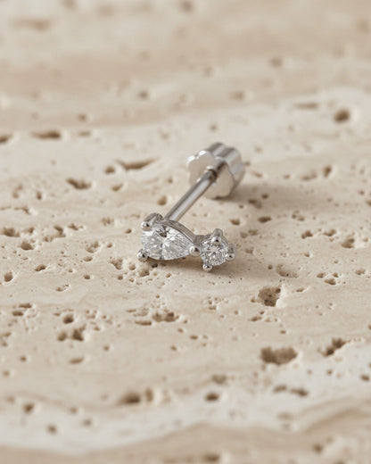 pear and round flatback piercing.