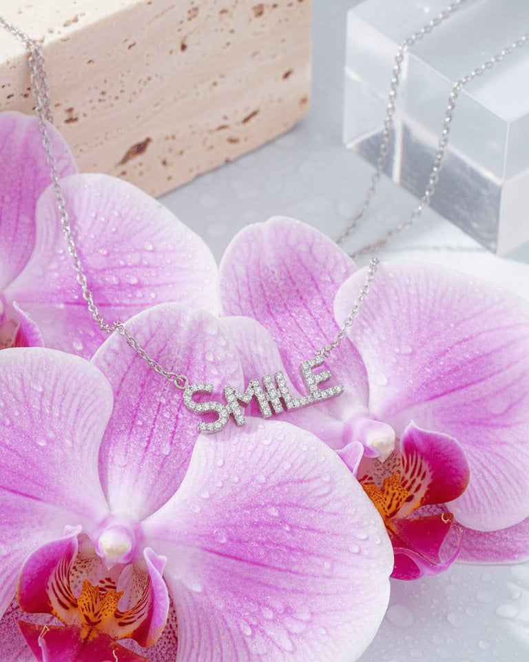 SMILE word necklace.
