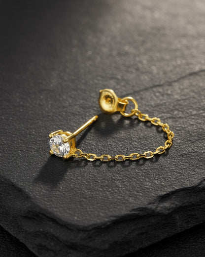 single stud CZ stone with back dangling chain.