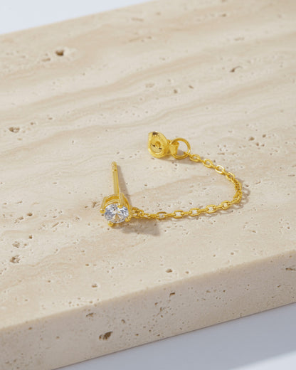 single stud CZ stone with back dangling chain.