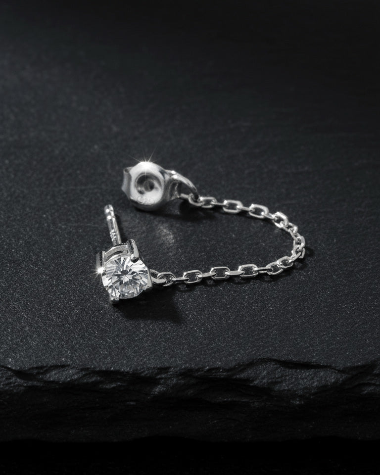 single stud CZ stone with back dangling chain.