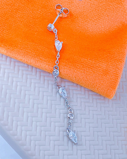 CZ long earring with round and pear shape stones.