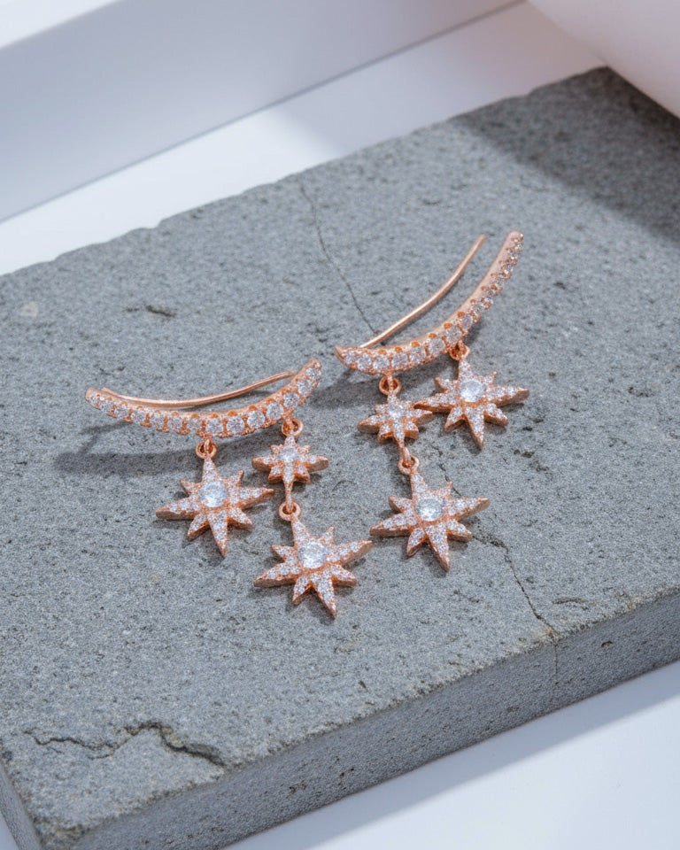 dangling stars climber earrings.