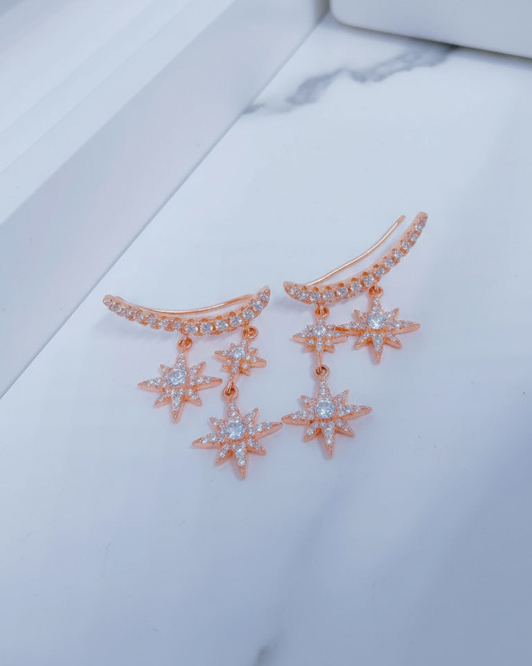 dangling stars climber earrings.