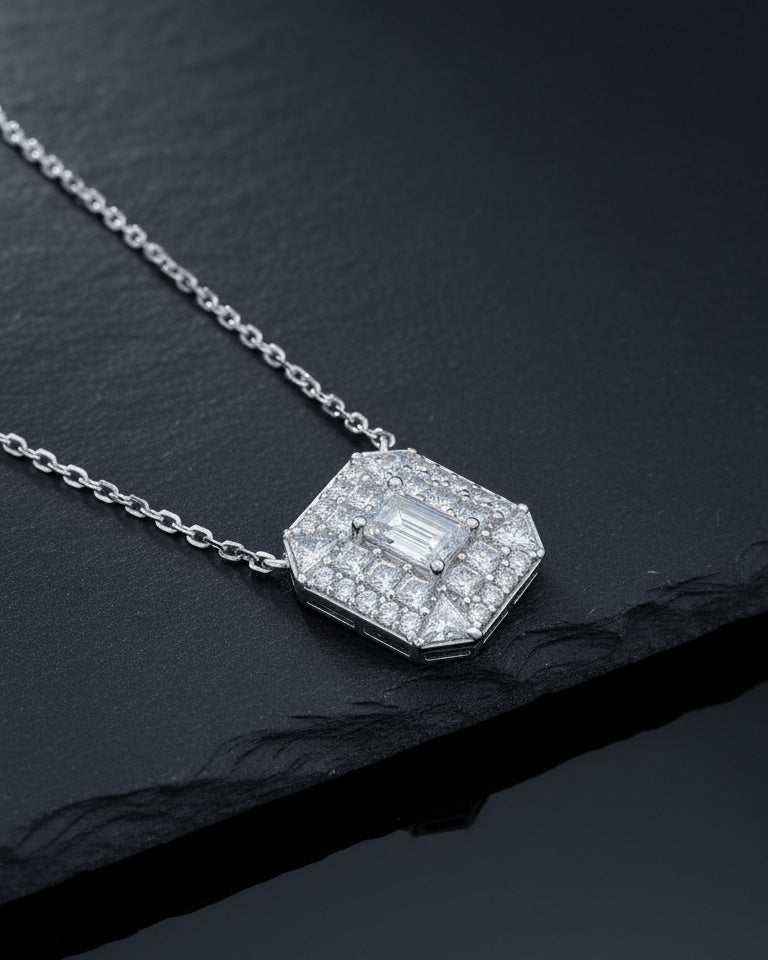 rectangular shape necklace with emerald cut CZ stone in center.