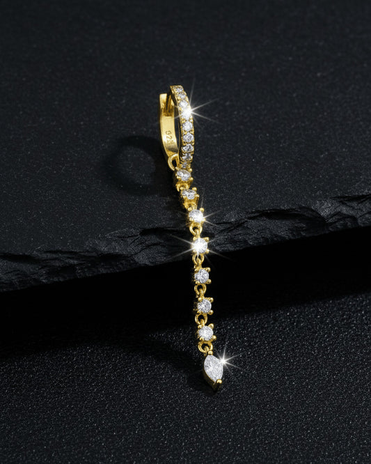 CZ huggie hoop earring with detachable line of links studded with round stones.