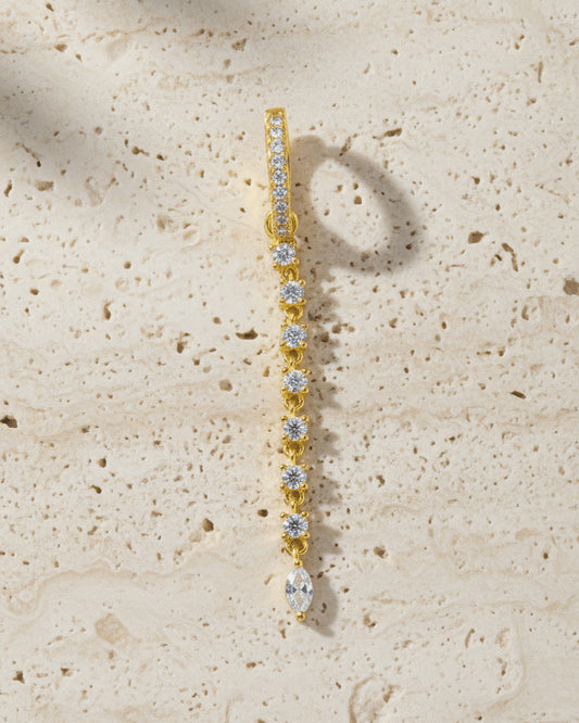 CZ huggie hoop earring with detachable line of links studded with round stones.