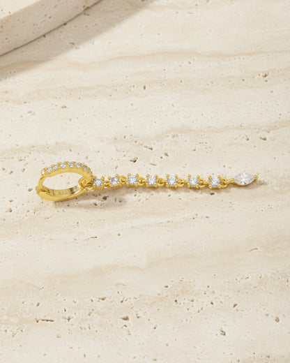 CZ huggie hoop earring with detachable line of links studded with round stones.