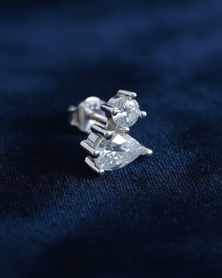 toi et moi round and pear shape stud earring.