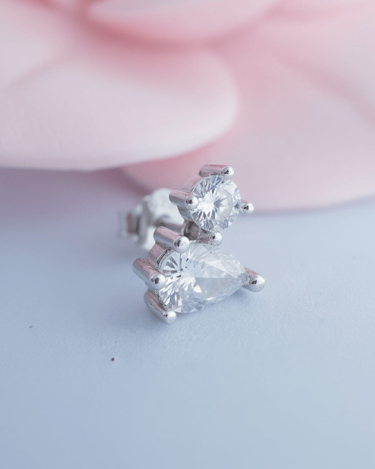 toi et moi round and pear shape stud earring.