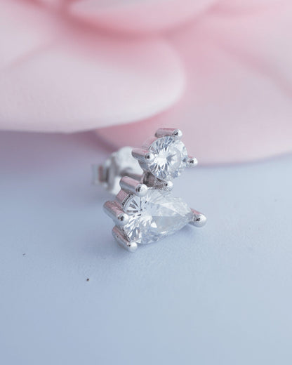 toi et moi round and pear shape stud earring.