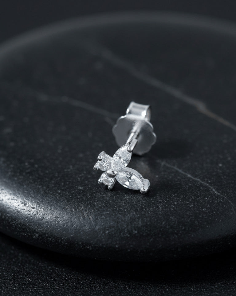 tiny butterfly shape stud earring.