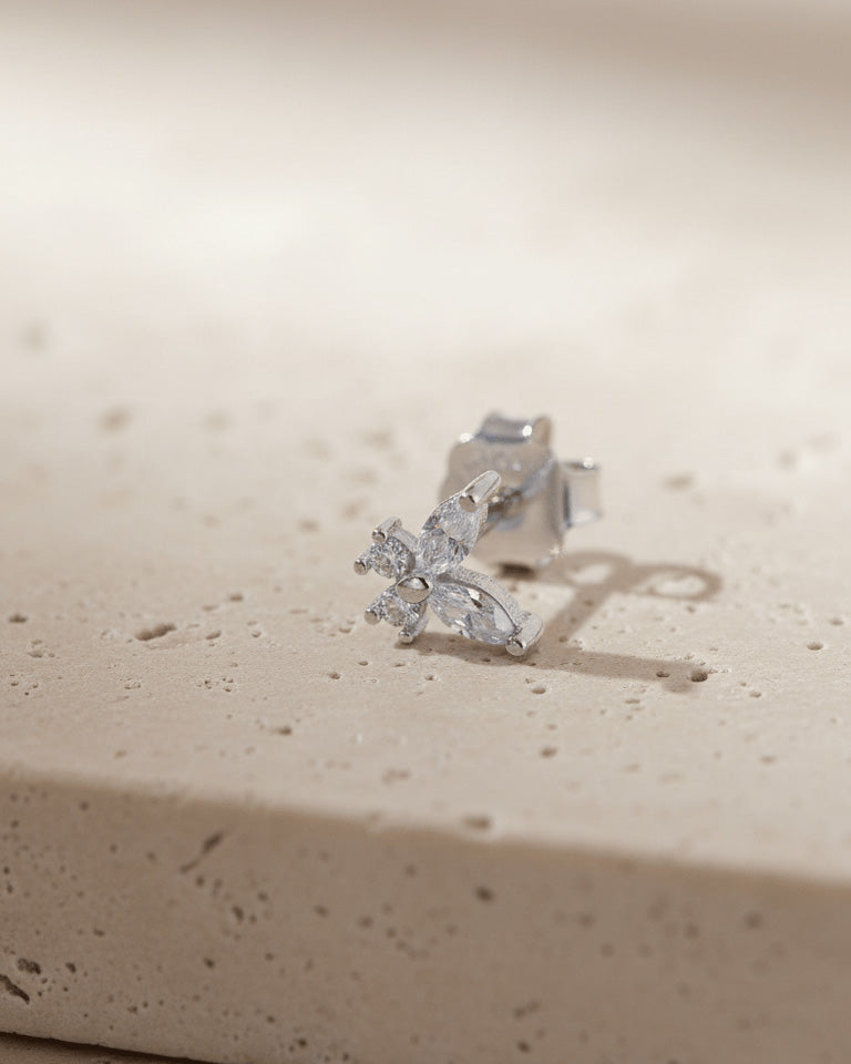 tiny butterfly shape stud earring.