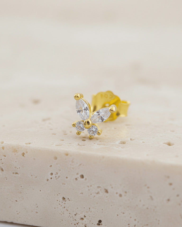 tiny butterfly shape stud earring.