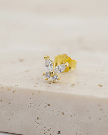 tiny butterfly shape stud earring.