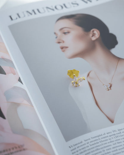 tiny butterfly shape stud earring.