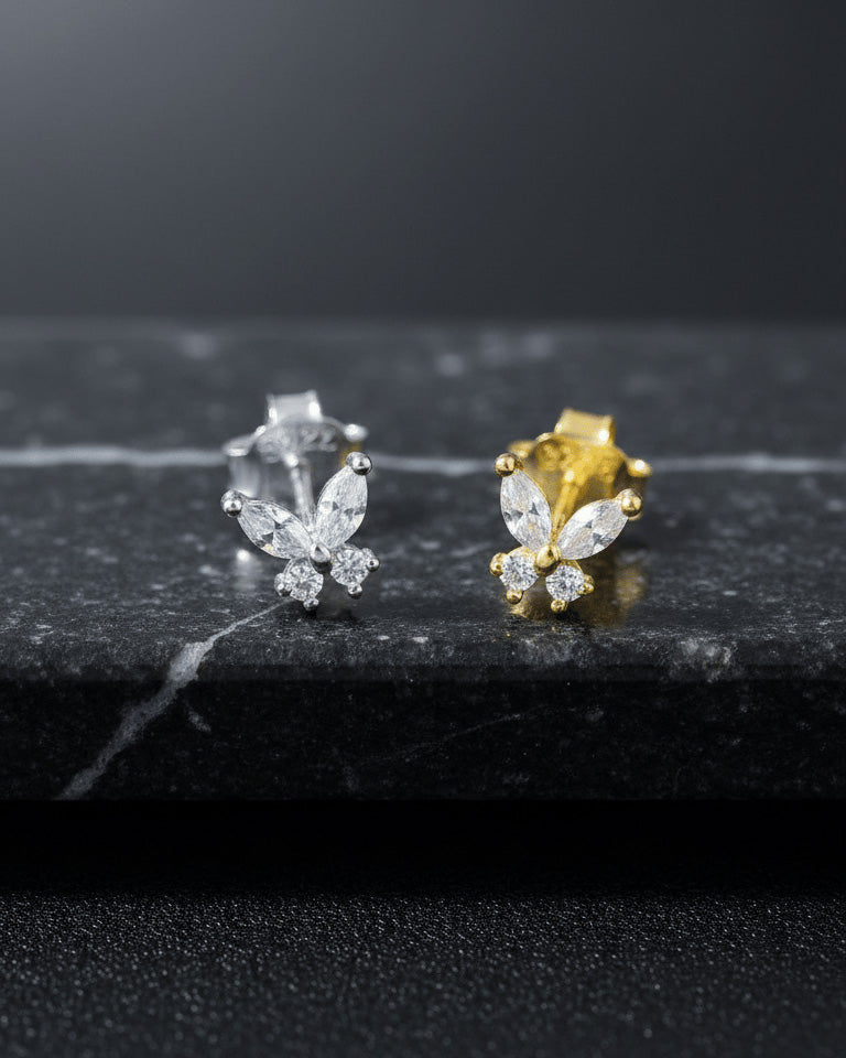 tiny butterfly shape stud earring.