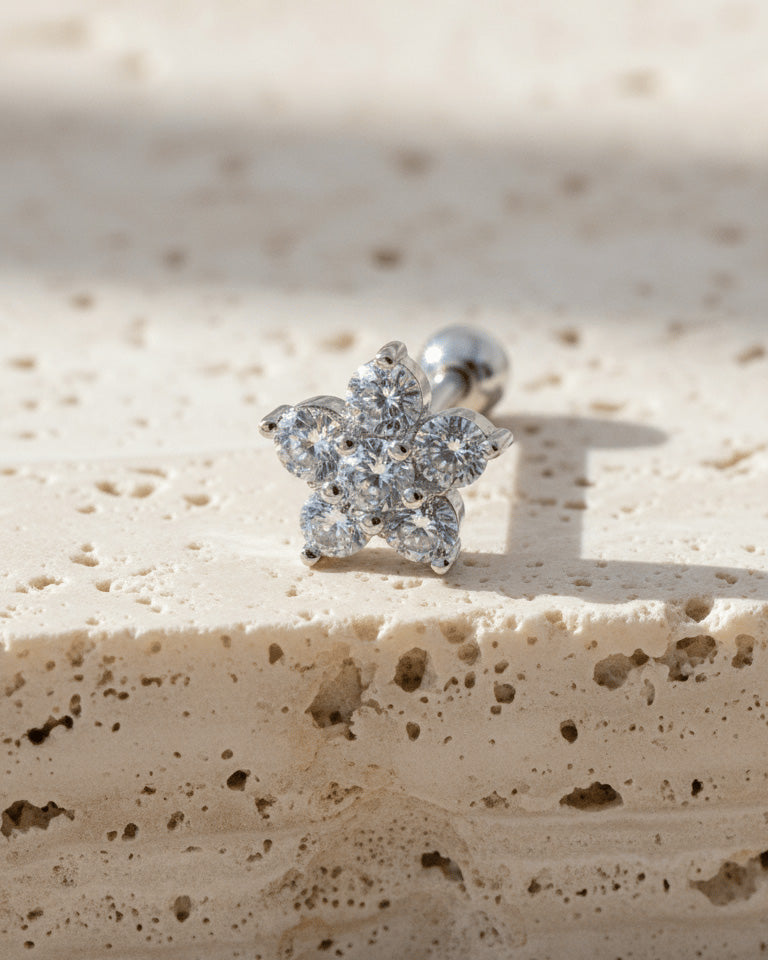 CZ cluster flower shape ballback piercing.