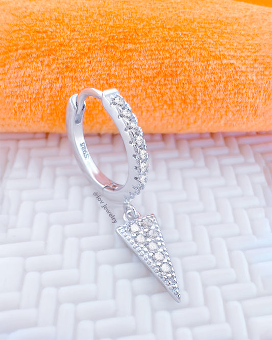 CZ huggie hoop with dangling triangle shape.