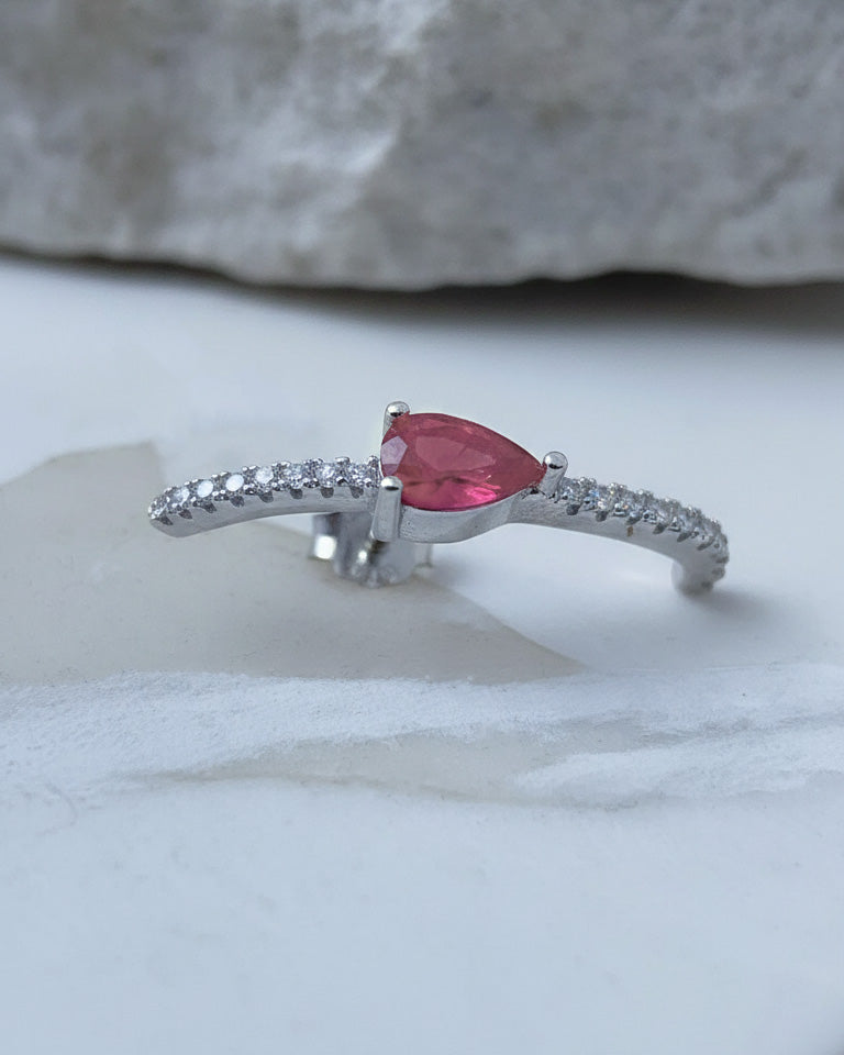 curved CZ line with pear colored stone stud earring.