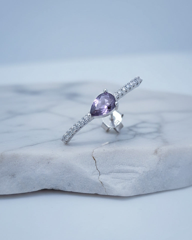 curved CZ line with pear colored stone stud earring.