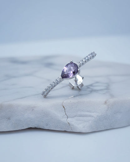 curved CZ line with pear colored stone stud earring.