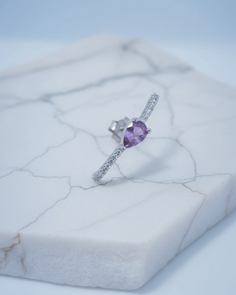 curved CZ line with pear colored stone stud earring.