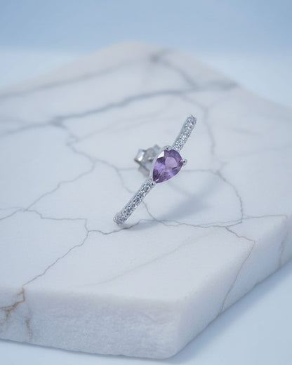 curved CZ line with pear colored stone stud earring.
