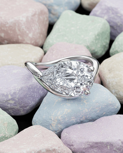 wavy shape ring with pear shape.