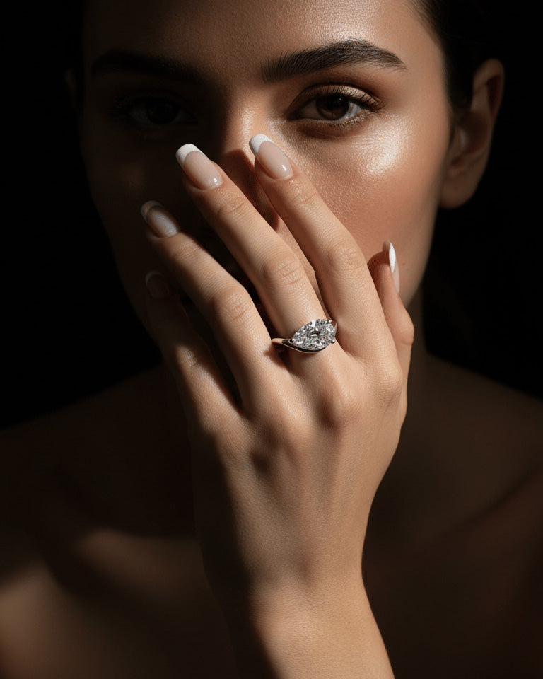 wavy shape ring with pear shape.