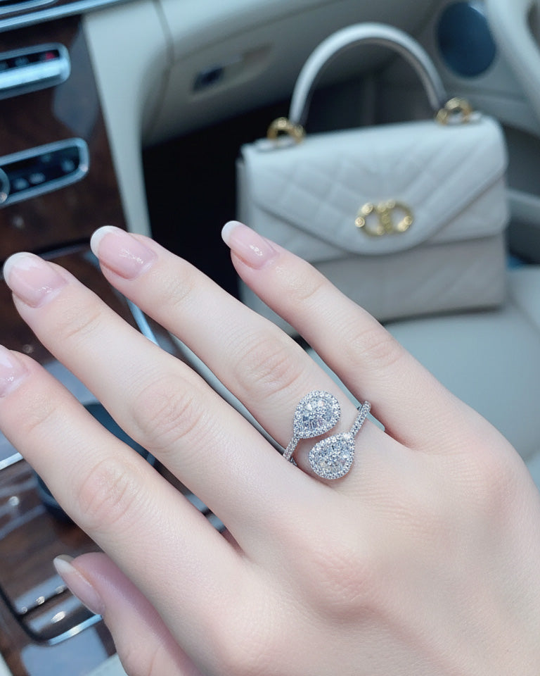 pear shape open ring with trapezoid and round CZ.