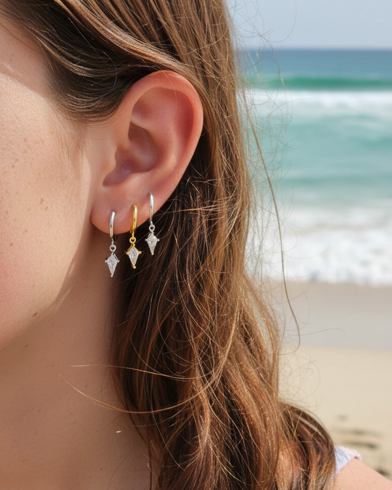 8 mm plain hoop with dangling CZ kite shape earring.