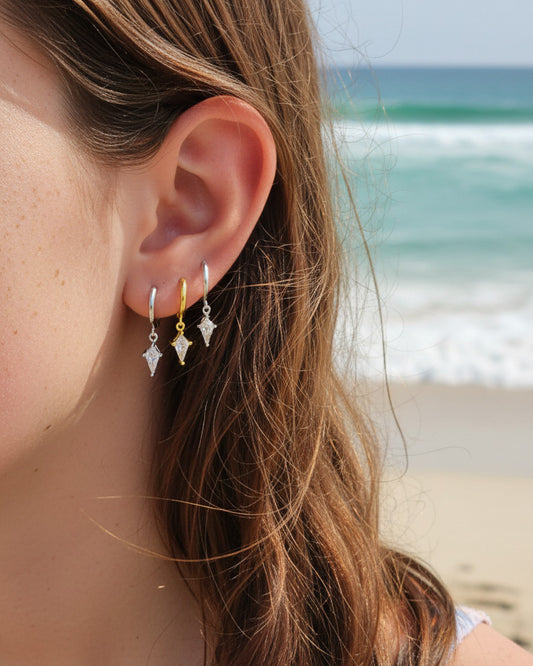 8 mm plain hoop with dangling CZ kite shape earring.