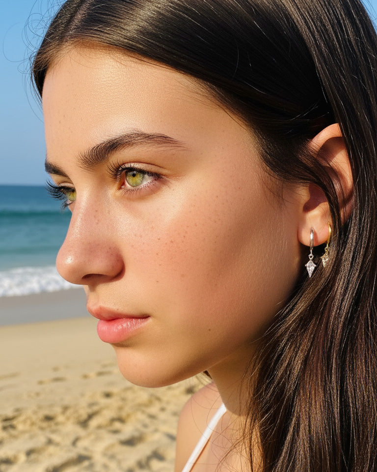 8 mm plain hoop with dangling CZ kite shape earring.