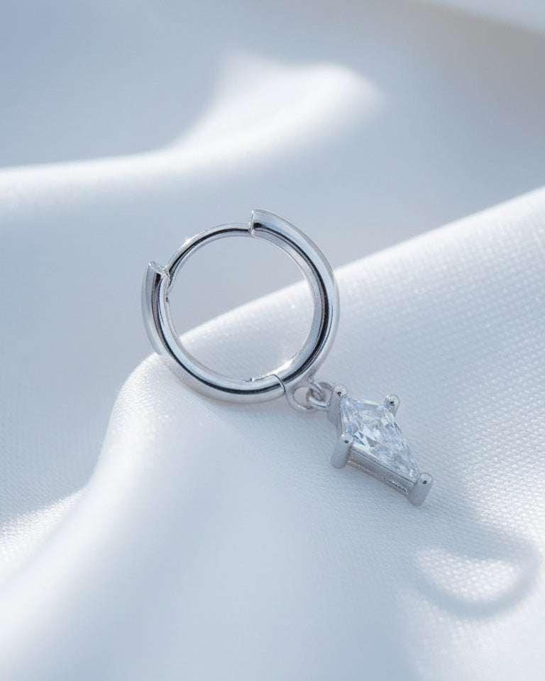 8 mm plain hoop with dangling CZ kite shape earring.