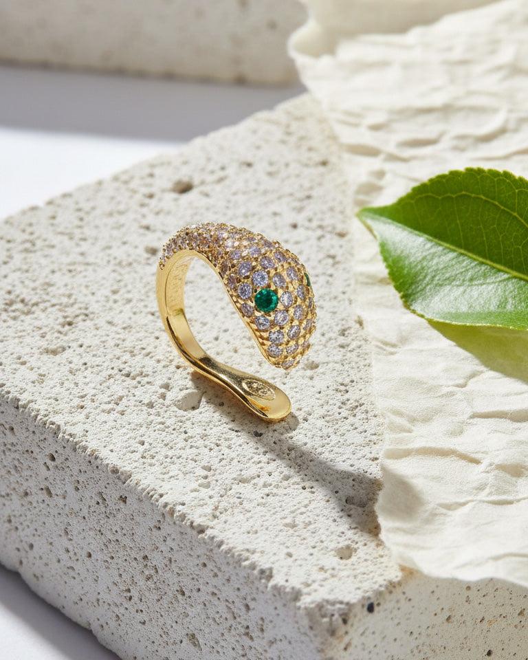snake earcuff with emerald eyes.