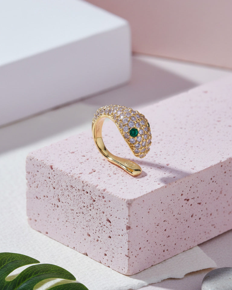 snake earcuff with emerald eyes.