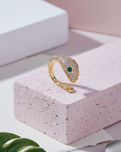 snake earcuff with emerald eyes.